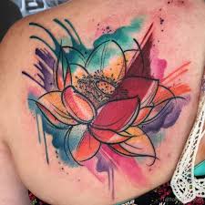 Social network for tattoo artists, article ratings and many professional tattoos. Amazing Watercolor Lotus Tattoo On Back