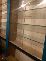 رفوف محل موبايلات ديكور حديد وخشب محلات Facebook