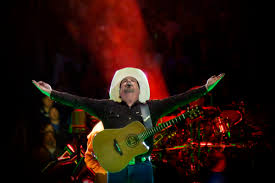 Want to see garth brooks in concert? Review Garth Brooks At Mile High Stadium In Denver The Know