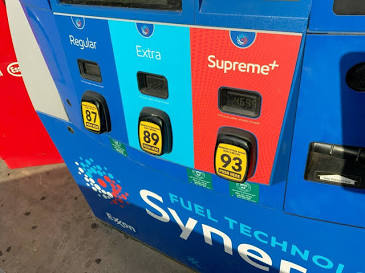 Modern retail fuel terminal offering direct to consumer integration and rewards, generated by AI.