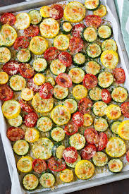 This roasted zucchini and squash is baked until tender with italian herbs and parmesan cheese! Roasted Garlic Parmesan Zucchini Squash And Tomatoes Cooking Classy
