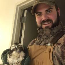 What kinds of beneficial aquatic vegetation should I add to my pond near  Kansas City?