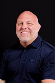 Mark “Buck” Odom