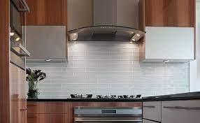 A glass tile backsplash is a great way to add color and visual interest to your kitchen, and you'll also find that the tiles can be arranged in an endless array of patterns, adding even more distinct style and design flair. Evolve Your Kitchen With Glass Glass Subway Tile Backsplash White Glass Tile Glass Subway Tile