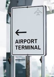 Download White Traffic Signboard Mockup At An Airport Psd Template T Shirt Mockup Template Download PSD Mockup Templates