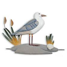 Abstract designs, coastal animals, personalized signs, and so much more add personality to your surroundings. Nautical Decor Beach Wooden Seagull Wall Sculpture Wall Sculptures Colorcard De