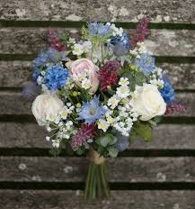 Also known as bachelor buttons, legend has it that Mixed Flower Hand Tied Wedding Bouquet Blue Cornflowers Nigella And Eryngium Blue Wedding Bouquet Bridal Bouquet Blue Wedding Bouquets