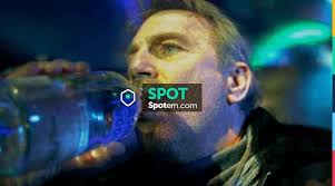 The bottle of Absolut Vodka, Ethan Renner (Kevin Costner) in 3 Days to Kill 