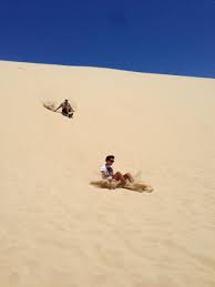 10 Essential Things To Do In Newcastle Australia Backstreet Nomad Sandboarding Stockton Beach Newcastle
