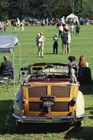 A Vintage Car A Huge Fortnum And Mason S Picnic Hamper And Champagne In The Boot Perfect For Watching An Afternoon S Polo Voiture En Bois Auto Retro Voiture