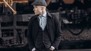 The peaky blinders are under attack. How History Influenced The Peaky Blinders Style Acorn Fabrics