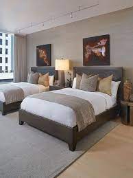 Inspiration For A Transitional Light Wood Floor Bedroom Remodel In San Francisco With Beige Walls Twin Beds Guest Room Guest Room Decor Hotel Bedroom Decor