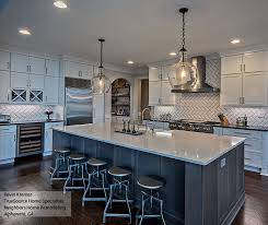 White Kemper Cabinets With Storm Island Fixer Upper Kitchen Island White Shaker Kitchen Cabinets White Shaker Kitchen