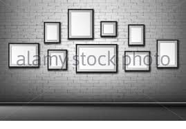 As you start browsing furniture, decorating and wall ideas for your room, think about the space's desired purpose and focus on a few staple items, such as a comfortable sofa and a coffee table, then choose the rest of the accent furniture and wall decor accordingly. Blank Frames On Grey Brick Wall Background Empty Borders For Photo Or Picture Hanging In Room Museum Or Office Home Decor Mockup For Exhibition Art Framing Realistic 3d Vector Illustration Stock Vector