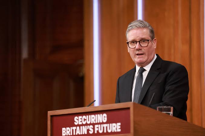 What are British PM Starmer's new policies to curb net migration? | Reuters