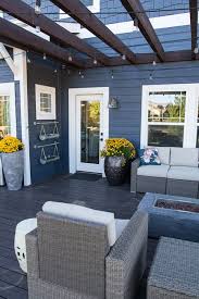 Check spelling or type a new query. Changing Up The Exterior With Paint And A Wood Garage Door Suburban Bees House Exterior Blue House Exterior Exterior Paint Colors For House