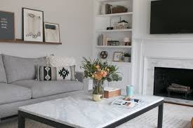 Sofa tables are really great in living rooms with open floor plans where the sofa doesn't sit against the wall. Living Room Decorating 101 Dos Don Ts The Diy Playbook