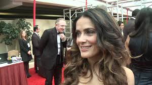 Looks expensive to be so ageless. Salma Hayek Arrives On The Red Carpet Golden Globes