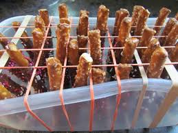 Chocolate Dipped Pretzels And A Genius Cooling Rack Chocolate Dipped Pretzels Chocolate Dipped Pretzel Rods Chocolate Dipped