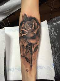 This forearm sleeve tattoo is a beautiful sketch of a native american warrior and is a masterpiece. Black Rose Tattoo On Forearm