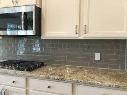 Glass tile, mosaics, and decorative accents are a great addition to any home. Color Waves Feather White 3x6 Glass Tile Backsplash Large Kitchen Design Grey Kitchen Gray Kitchen Backsplash
