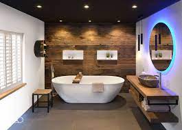 badkamerinspiratie in deze badkamer worden natuurlijke materialen zoals hout en beton met elkaar gecombineer badkamer badkamer voorbeelden badkamer hanglamp