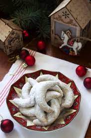 Place seam side down on parchment covered cookie sheet. Premium Photo Czech Vanilla Crescents Cookies With Christmas Ornaments