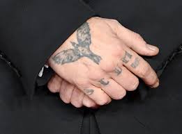 Depp's knuckle tattoo still reads slim. may 10, 2016. Amber Heard Appears To Shade Johnny Depp S Scum Tattoo On Instagram Etcanada Com