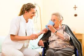 Young Nurse And Female Senior In Nursing Home The Old Lady Sitting In A Wheel C Ad Senior Nursing Female Young Nurse Ad Nursing Home Nurse Young
