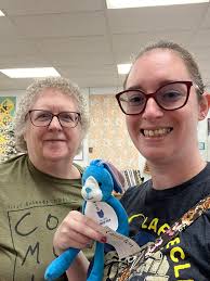 We are bird watchers, so I chose some of the most common birds seen at our  feeders throughout the year. The quilt's colorful fabric came from scraps  my mom collected over the