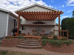 Attach two beams at the top of the posts so that the posts are 'sandwiched' between the beams. Staining And Sealing Wood Pergolas Discover The Best Pergola Stain Colors More Pergola Depot