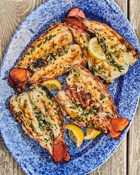 Traeger this quick & simple seafood recipe on a weeknight, smoke lobster for a special celebratory dinner, or top a thick simply cut a slit to butterfly the lobster tails, pour the butter mixture, then let our signature heat and smoke do the rest. Grilled Lobster Tail With Garlic Butter Recipe Kitchn