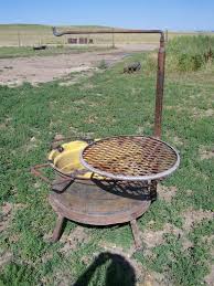 Fire Pit Made From A Tractor Wheel Grate And Steel For Holding Pots Fire Pit Fire Pit Bbq Outdoor Fire