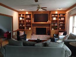 The bookshelf pictured has been stained dark walnut. Honey Oak Built In Bookshelves