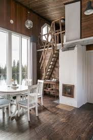 Get onboard with the wood slat wall trend with this luxurious home interior interior design around walnut wood finishes: Perfect Scandinavian Style Small House By Water Small Wooden House Dream House Interior House Styles
