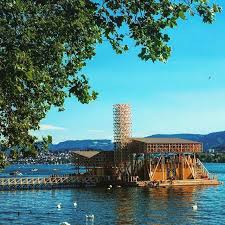 happy monday and enjoy the sunshine in zurich here s a view of the pavillon of reflections on the lake part of the manifesta european lake zurich
