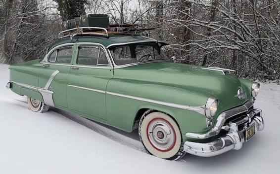 My 52 Oldsmobile 98... Original fender skirt and optional visor 💚