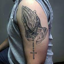 Praying hands with cross necklace tattoo. Pin On Cojo