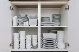 To this effect, the front kitchen cabinets will give you long lifespans without breakage or need for repairs. Dishware Storage Cabinet With Plates And Cups Inside Stock Photo Image Of Cups Interior 143757164