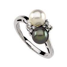 Some even feature gemstones and diamonds for a little color and sparkle. 8 Rings Ideas Pearl Ring Rings Pearl White