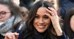 Her timeless three stone engagement ring boasts a center cushion diamond. Is Meghan Markle Wearing A Redesigned Engagement Ring