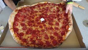 So, how many slices are in a large pizza? Request If This Pizza Has A Diameter Of 28 How Many Slices Of A 16 Pizza Would Make Up This Giant Full Length Pizza Slice Assuming The 16 Pizza Is Cut Into