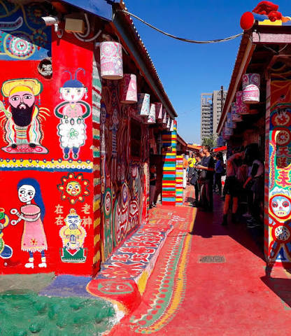 🌈 Taichung's famed attraction Rainbow Village is a guaranteed color  explosion. Now, imagine its bright, fun folk art coming to life: It's like  the personality-filled murals are ready to hop off the