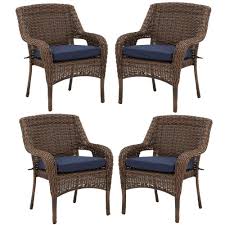 Hampton Bay Cambridge Brown Resin Wicker Outdoor Dining Chairs With Blue Cushions 4 Pack 65 7148b5 Chr The Home Depot In 2020 Outdoor Dining Chairs Blue Cushions Wicker Dining Chairs