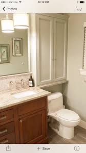 This attractive unit is constructed from durable manufactured wood with an espresso finish. Cabinet Over Toilet For Small Bathroom Toilet For Small Bathroom Small Bathroom Bathrooms Remodel
