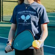 Called To Serve Collection This Summer, my family has enjoyed learning to  play pickleball. I had the idea at the start of the Summer to create a  clothing collection with a pickleball