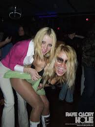 Rave Glory Hole.com - two sexy clubbing girls in club toilet sucking cocks  through gloryhole