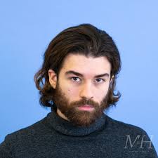 This cool long wavy haircut for guys has enough length for hair to wave while a high fade at the sides hair down to the skin. Long And Wavy Man For Himself
