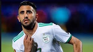 Ù†Ø¬Ù… Ø§Ù„ÙƒØ±Ø© Ø§Ù„Ø¬Ø²Ø§Ø¦Ø±ÙŠ Ø±ÙŠØ§Ø¶ Ù…Ø­Ø±Ø² ÙŠØ¨Ø¯ÙŠ ØªØ¶Ø§Ù…Ù†Ù‡ Ù…Ø¹ ÙÙ„Ø³Ø·ÙŠÙ† ÙˆÙƒØ§Ù„Ø© Ù†ÙŠÙˆ ØªØ±Ùƒ Ø¨ÙˆØ³Øª Ø§Ù„Ø§Ø®Ø¨Ø§Ø±ÙŠØ©
