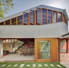 The adaptation of a farm barn into a building serving a different use, such as a house or. Australian Old Barn Conversion Into Modern House With Sliding Glass Doors And Exposed Brick Walls